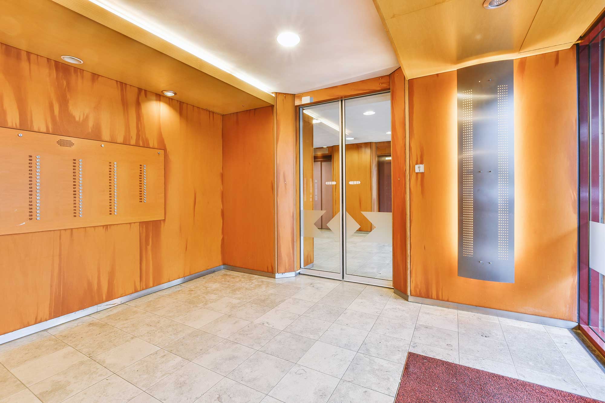 modern-elevator-in-apartment-building-hall-2022-06-14-16-24-04-utc.jpg